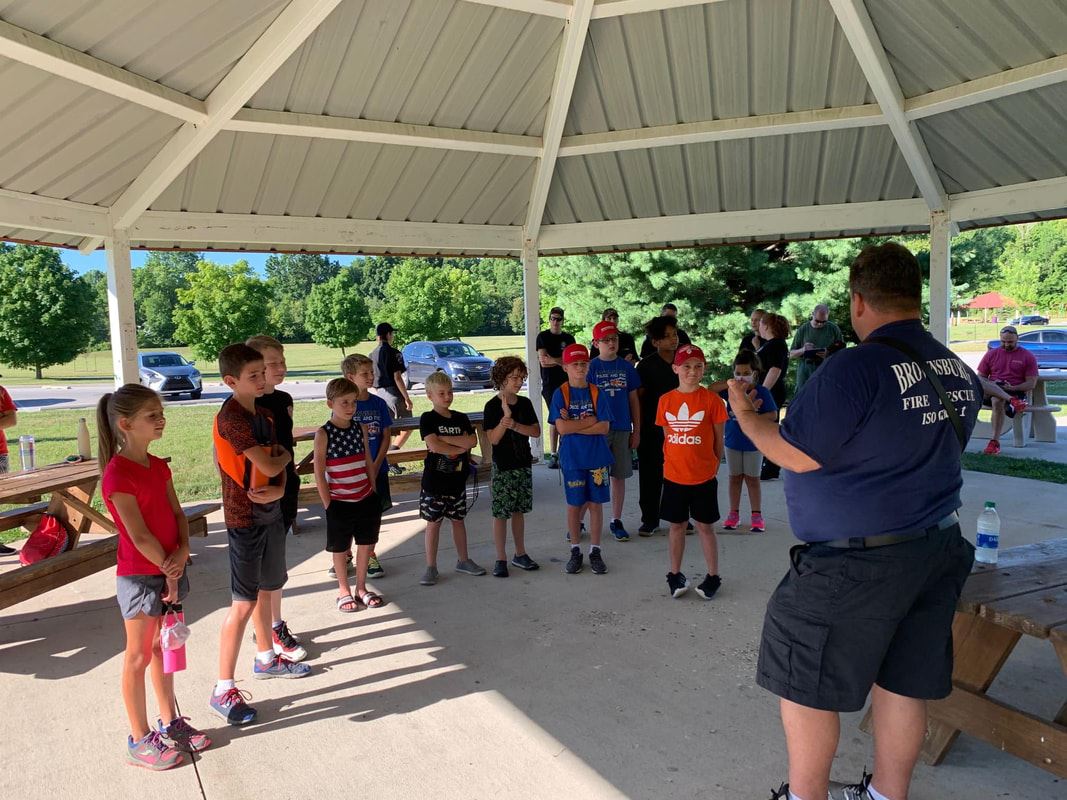 Children Listening to Fire Staff Member